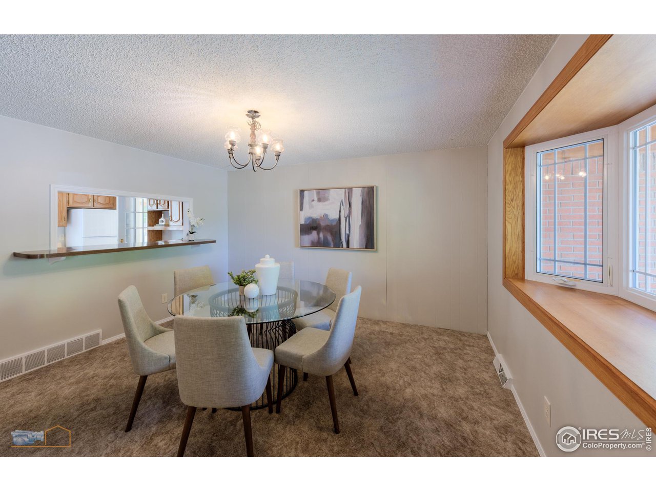 1050 Berea Drive Boulder, CO 80305 - Photo 16 of 40 a dining room with furniture and window