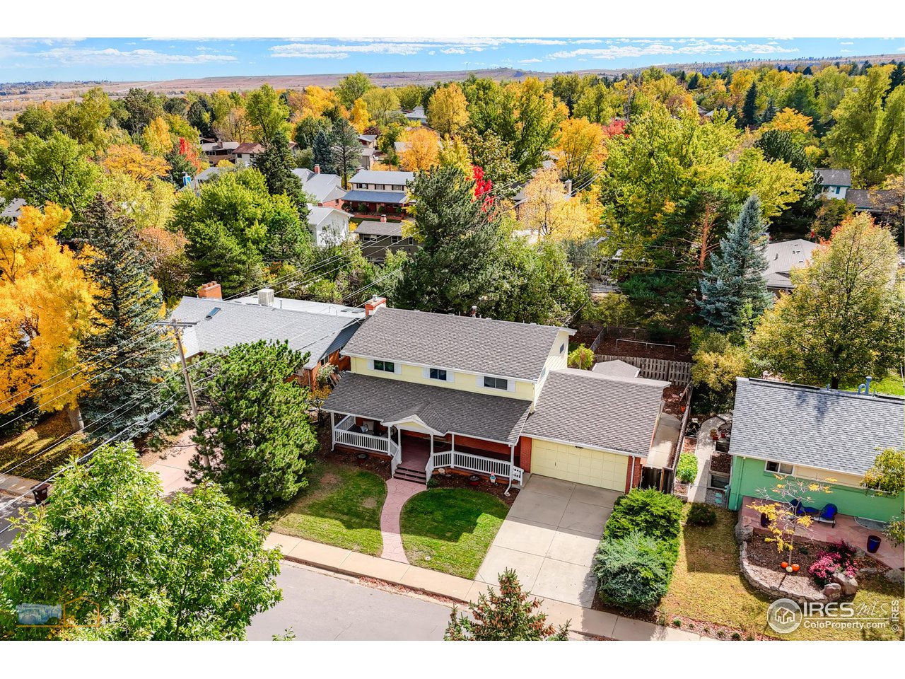 1050 Berea Drive Boulder, CO 80305 - Photo 2 of 40 an aerial view of a house with a garden and lake view