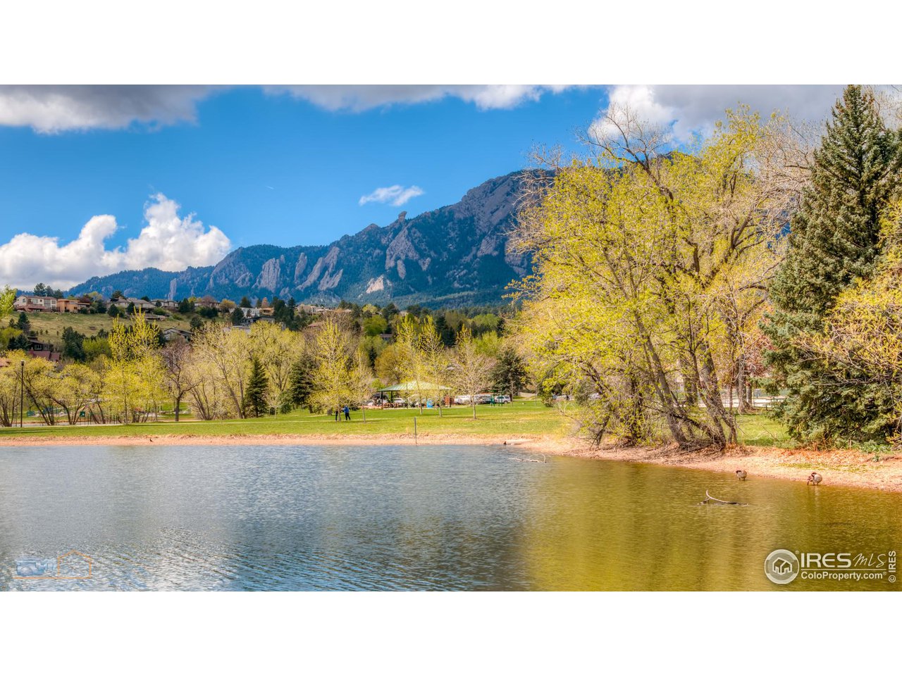 1050 Berea Drive Boulder, CO 80305 - Photo 32 of 40 a view of a yard with an ocean view