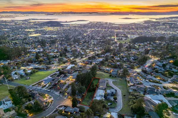an aerial view of residential building and lake view