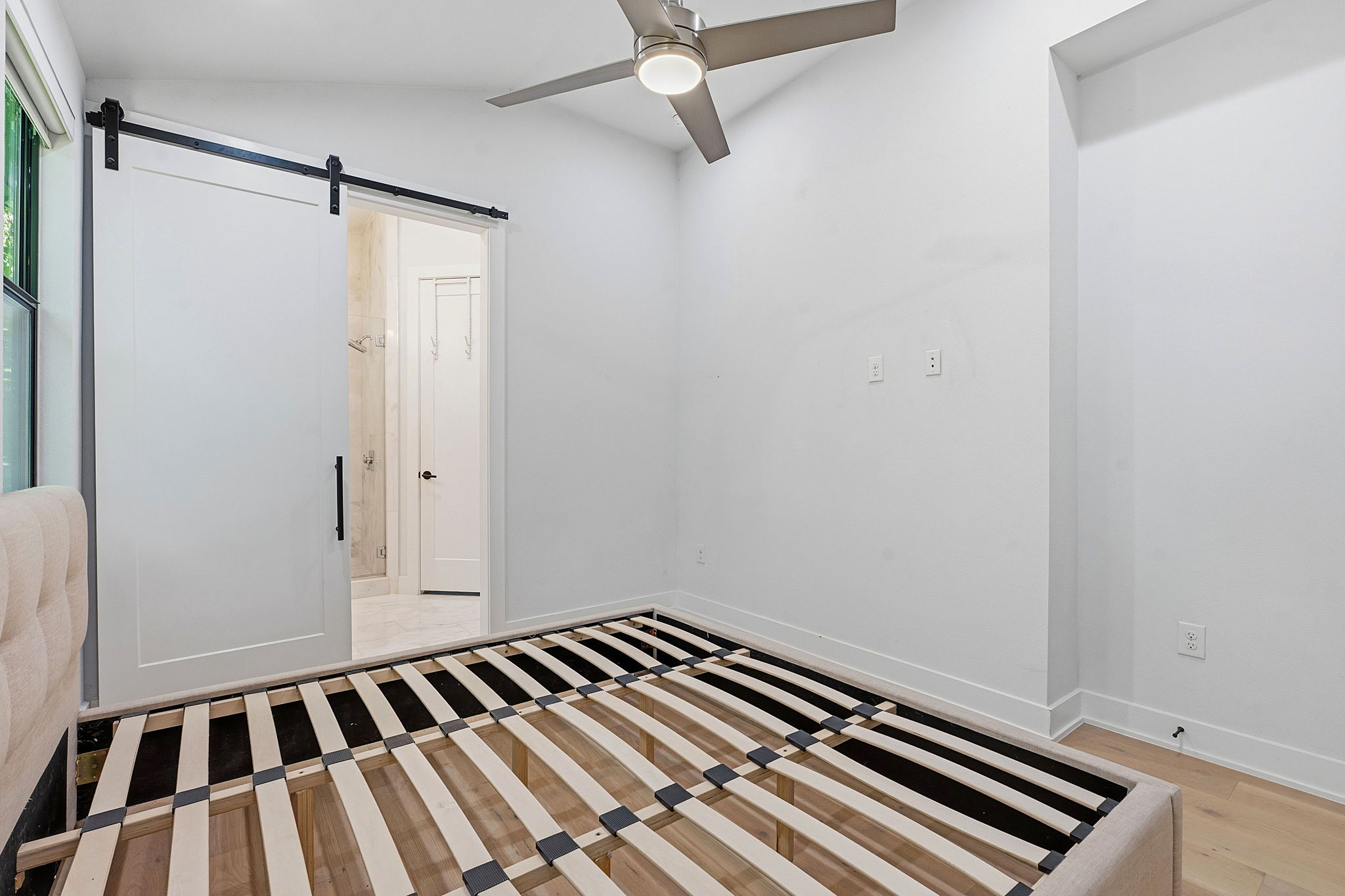 2935 Moss Street, Unit 2 Austin, TX 78722 - Photo 8 of 20 Primary bedroom pictured with a king sized bed