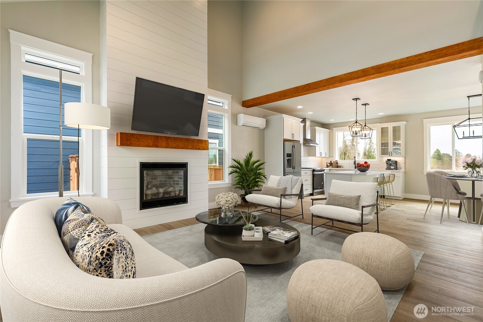 5950 Ranch Loop Ferndale, WA 98248 - Photo 2 of 6 a living room with furniture fireplace and a flat screen tv