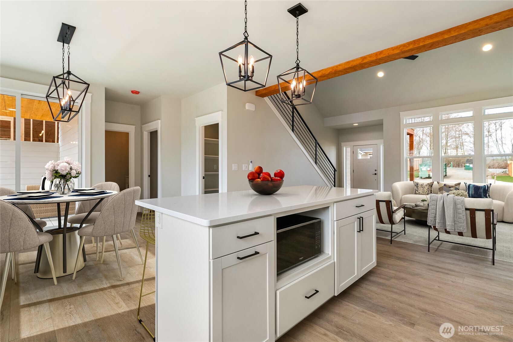 5950 Ranch Loop Ferndale, WA 98248 - Photo 4 of 6 a kitchen that has a table and chairs in it