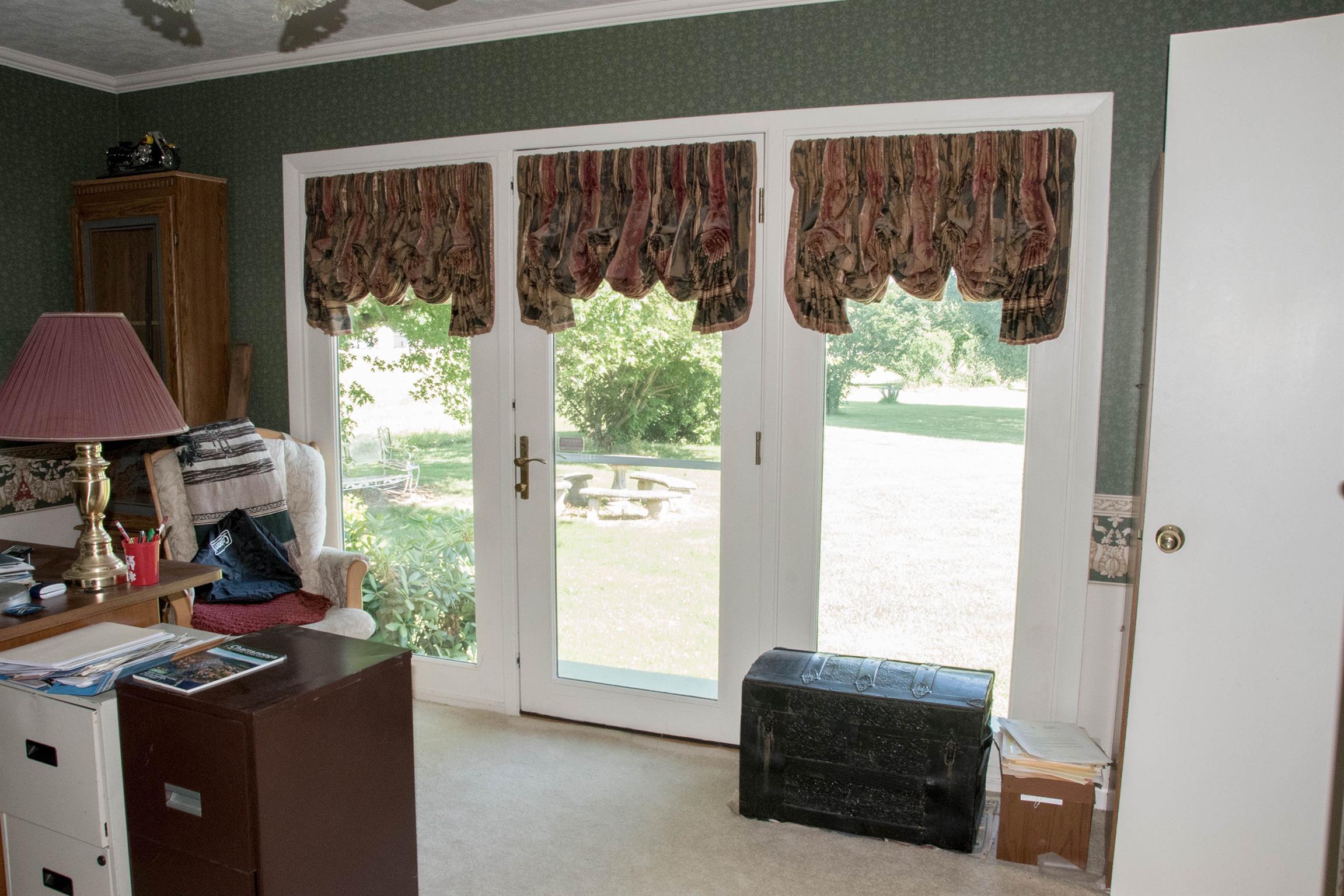 8531 Red Boiling Springs Road Lafayette, TN 37083 - Photo 14 of 29 a living room with furniture and a large window