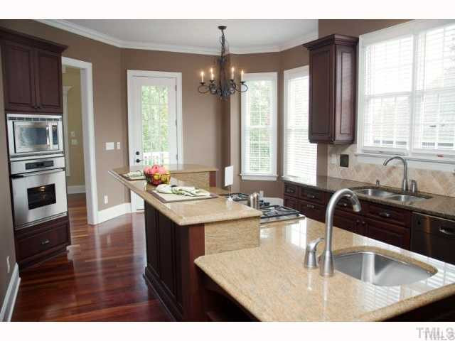 2701 Peachleaf Street Raleigh, NC 27614 - Photo 4 of 10 LOOK FROM THE KITCHEN INTO THE BREAKFAST AREA WITH YET ANOTHER PORCH THAT THIS HOME HAS TO OFFER. Kitchen