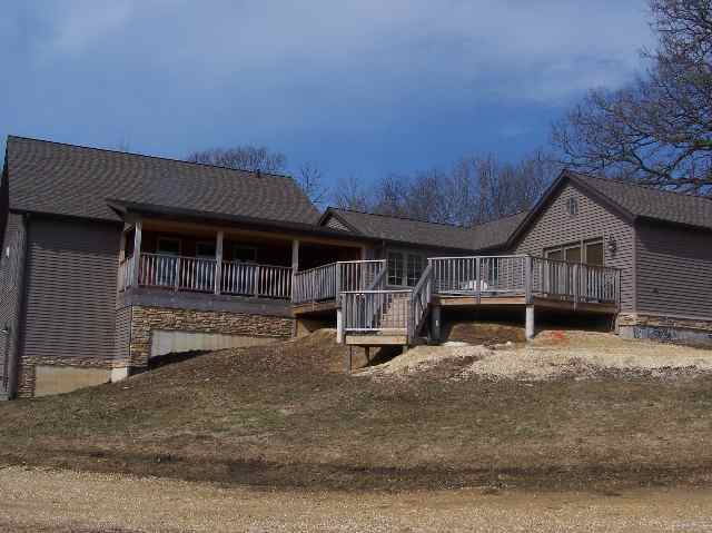2287 West Hanover Road Hanover, IL 61041 - Photo 1 of 9 a view of a house with wooden fence