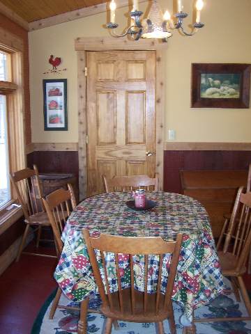 2287 West Hanover Road Hanover, IL 61041 - Photo 4 of 9 a view of a dining room with furniture and wooden floor