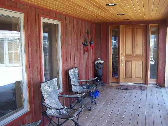 2287 West Hanover Road Hanover, IL 61041 - Photo 7 of 9 a view of a room with furniture wooden floor and front door