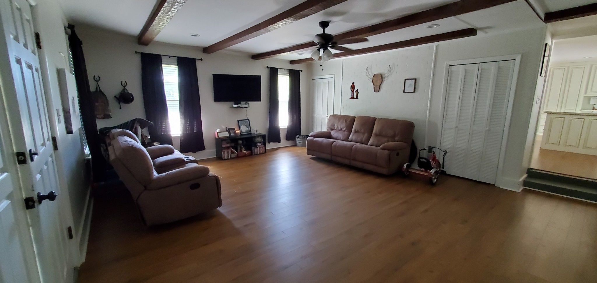 1915 Crescentview Road Pulaski, TN 38478 - Photo 13 of 28 a living room with furniture and a flat screen tv
