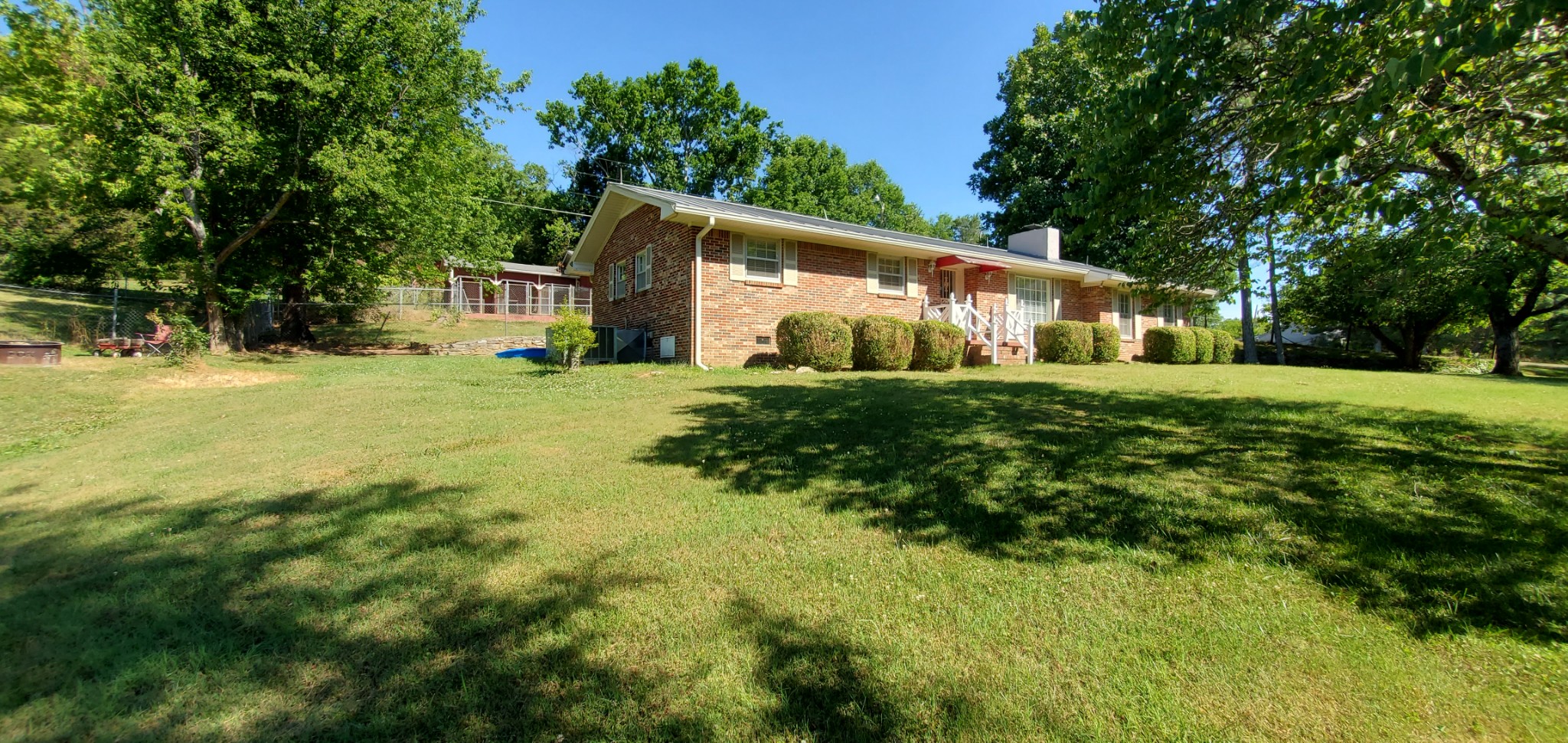 1915 Crescentview Road Pulaski, TN 38478 - Photo 2 of 28 a front view of a house with a yard
