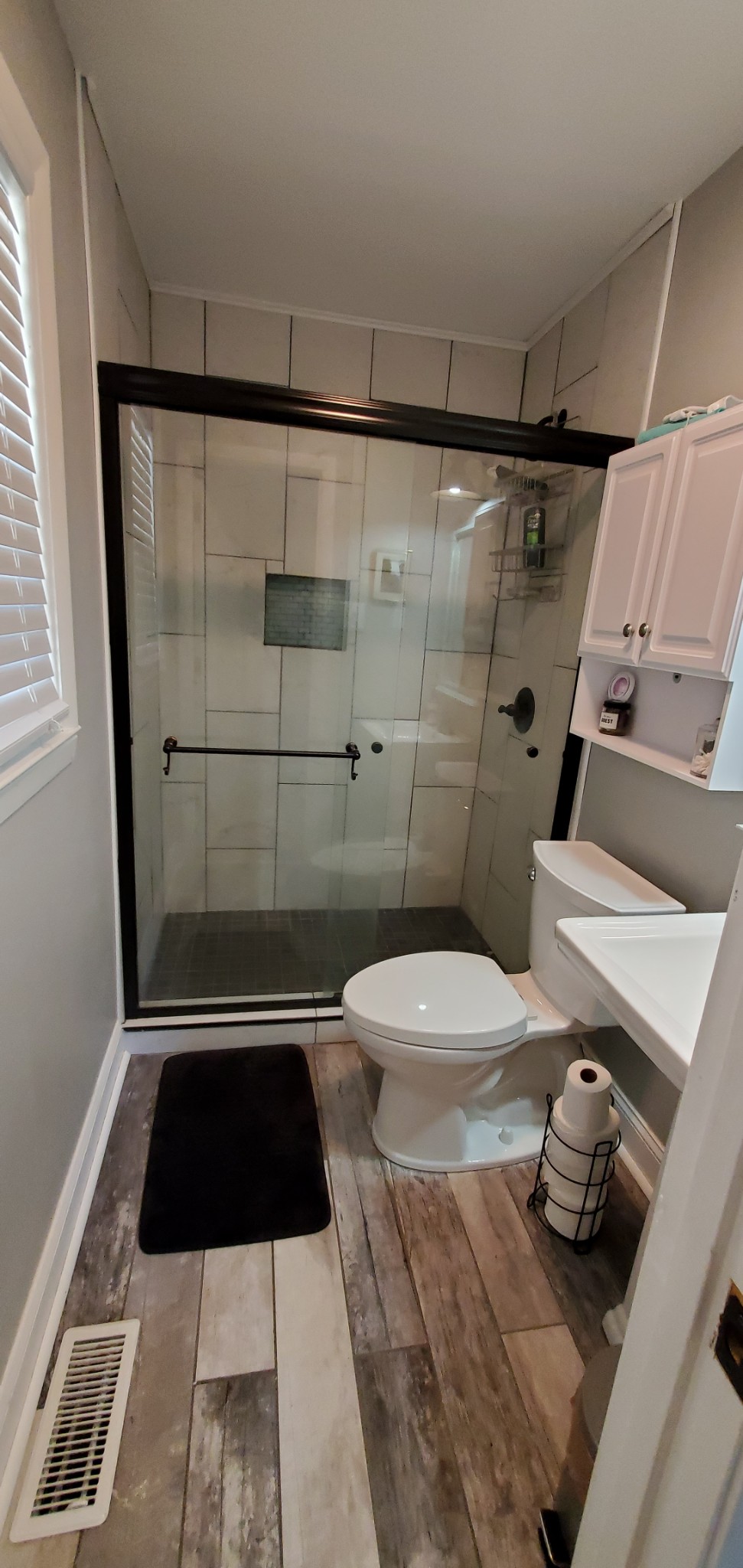 1915 Crescentview Road Pulaski, TN 38478 - Photo 26 of 28 a bathroom with a toilet and a shower