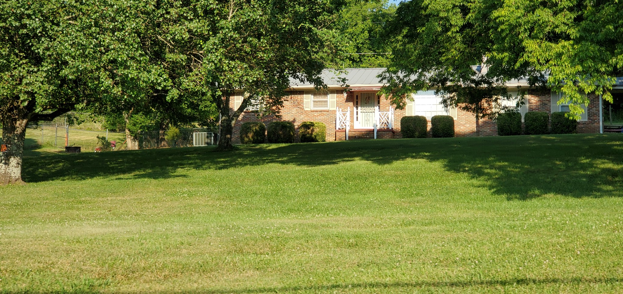 1915 Crescentview Road Pulaski, TN 38478 - Photo 7 of 28 a front view of a house with a yard