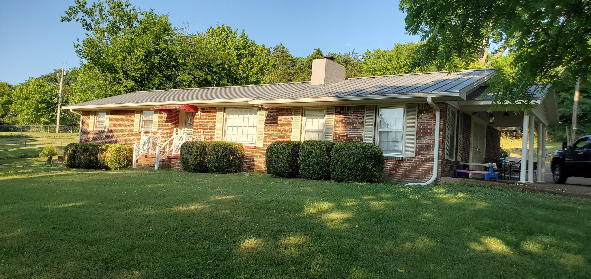 1915 Crescentview Road Pulaski, TN 38478 - Photo 10 of 28 a view of a house with a yard and plants