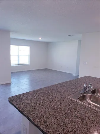 an empty room with a natural light