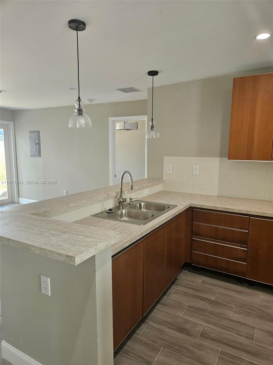 3906 Northwest 207 St Road, Unit 3906 Miami Gardens, FL 33055 - Photo 11 of 26 a kitchen with sink and window