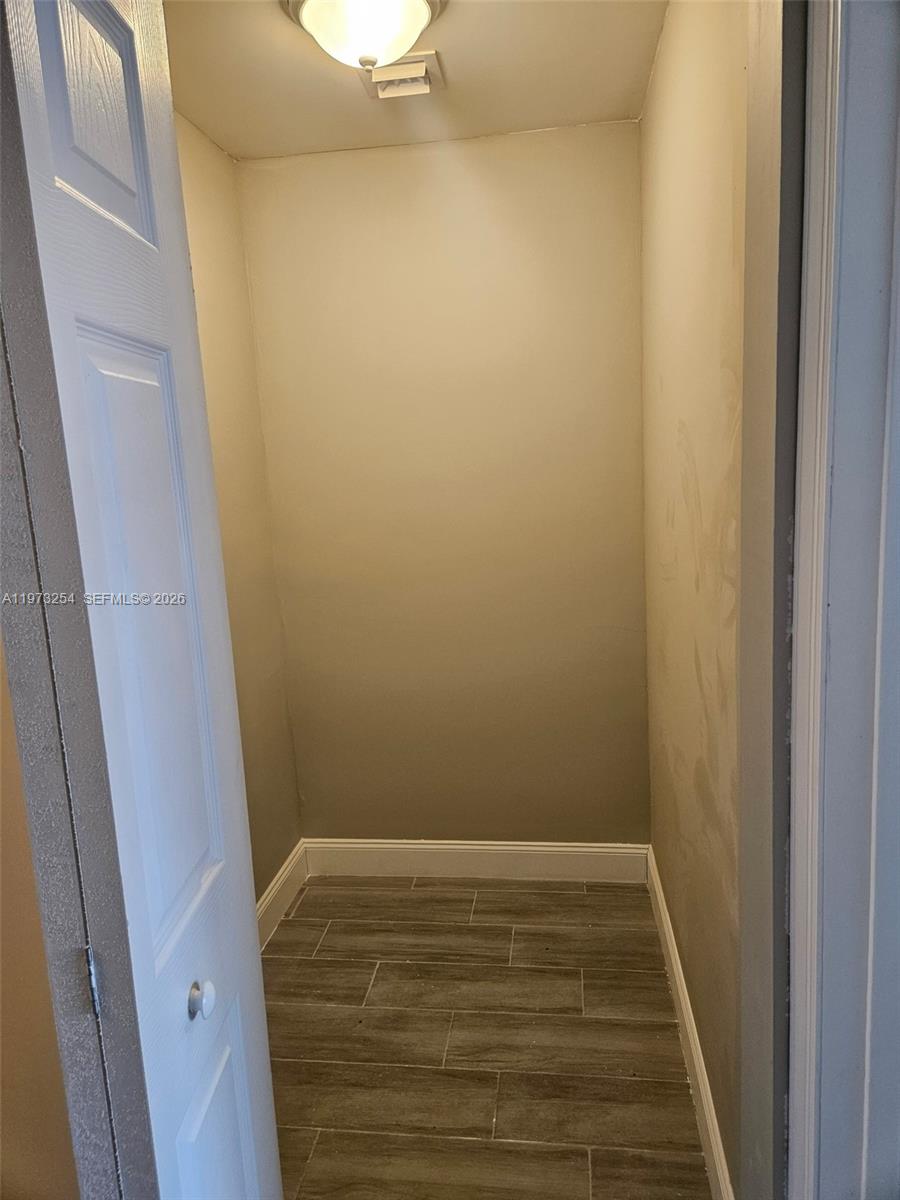 3906 Northwest 207 St Road, Unit 3906 Miami Gardens, FL 33055 - Photo 18 of 26 a view of closet
