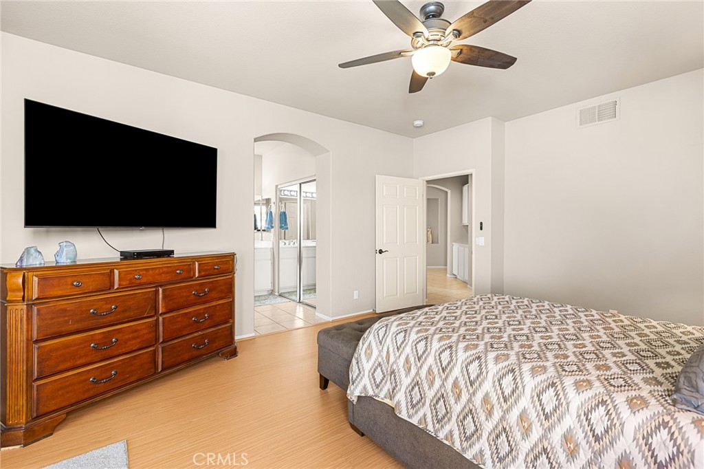 1318 South Bay Hill Road Banning, CA 92220 - Photo 18 of 53 Primary Bedroom Entrance and Entrance to Primary Bathroom & Walk-in Closet