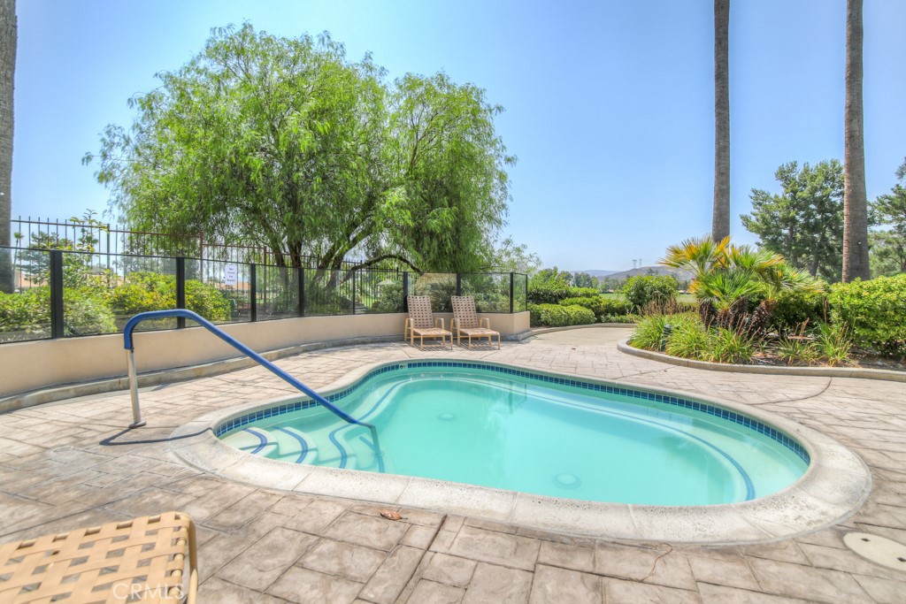 1318 South Bay Hill Road Banning, CA 92220 - Photo 32 of 53 a view of a swimming pool with a patio