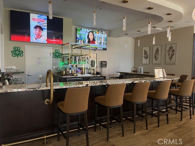 1318 South Bay Hill Road Banning, CA 92220 - Photo 33 of 53 a group of people sitting in a living room