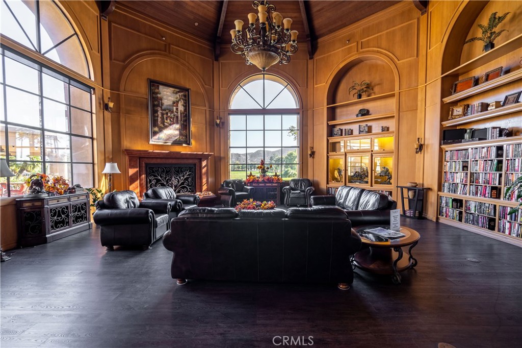 1318 South Bay Hill Road Banning, CA 92220 - Photo 36 of 53 a living room with fireplace furniture and a large window