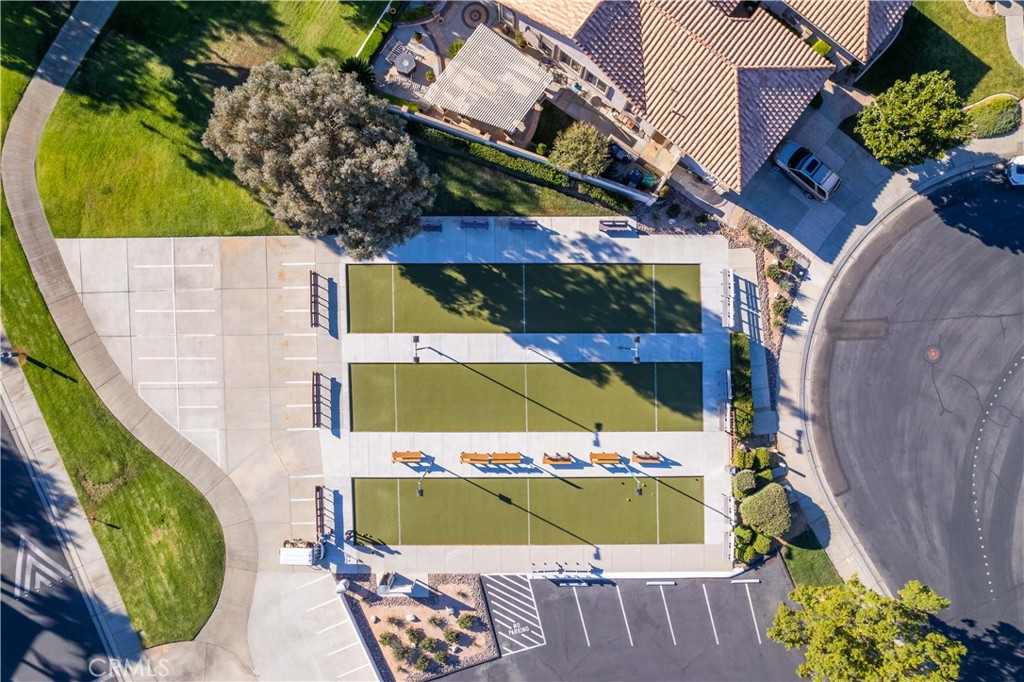 1318 South Bay Hill Road Banning, CA 92220 - Photo 52 of 53 an aerial view of a house with a yard and potted plants