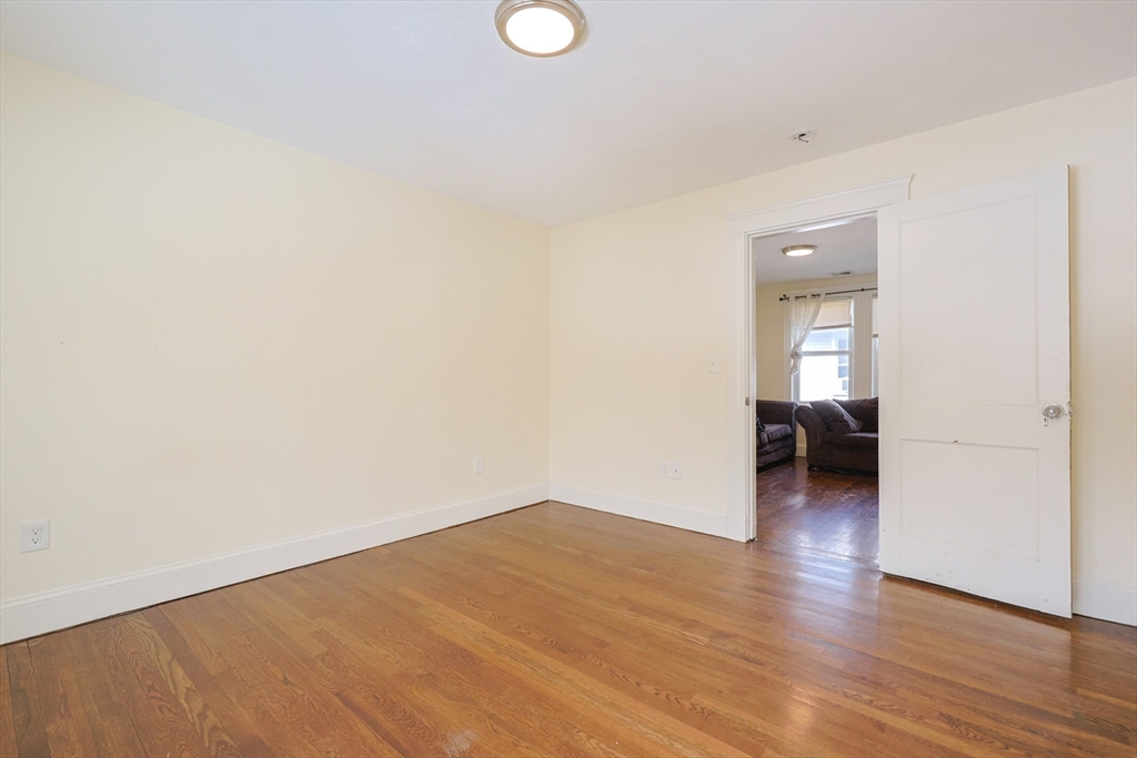 96 Mansfield Street Framingham, MA 01702 - Photo 17 of 39 a view of a room with wooden floor and a sink