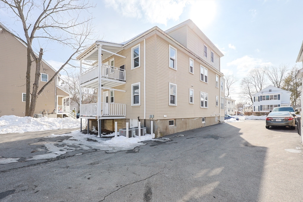 96 Mansfield Street Framingham, MA 01702 - Photo 3 of 39 a view of a white building