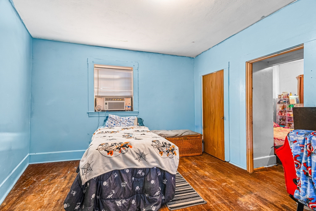 187 St Mary Street Needham, MA 02494 - Photo 17 of 28 a bedroom with bed and a window