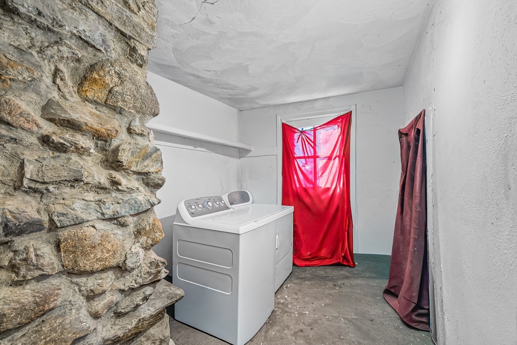 187 St Mary Street Needham, MA 02494 - Photo 26 of 28 a view of a bedroom with a bed