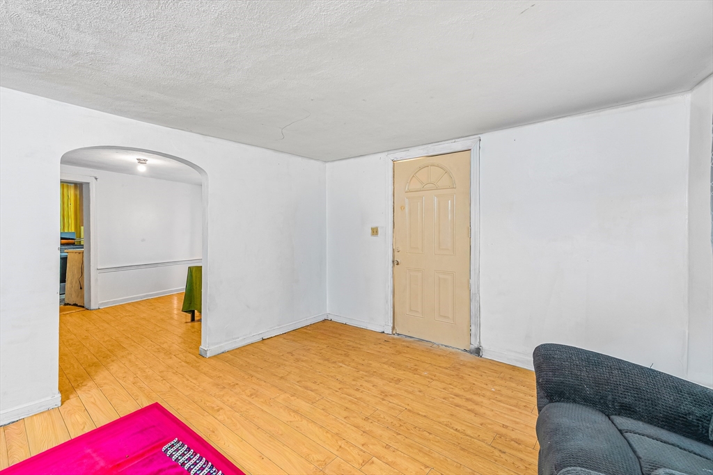 187 St Mary Street Needham, MA 02494 - Photo 6 of 28 a bedroom with a bed and painted walls