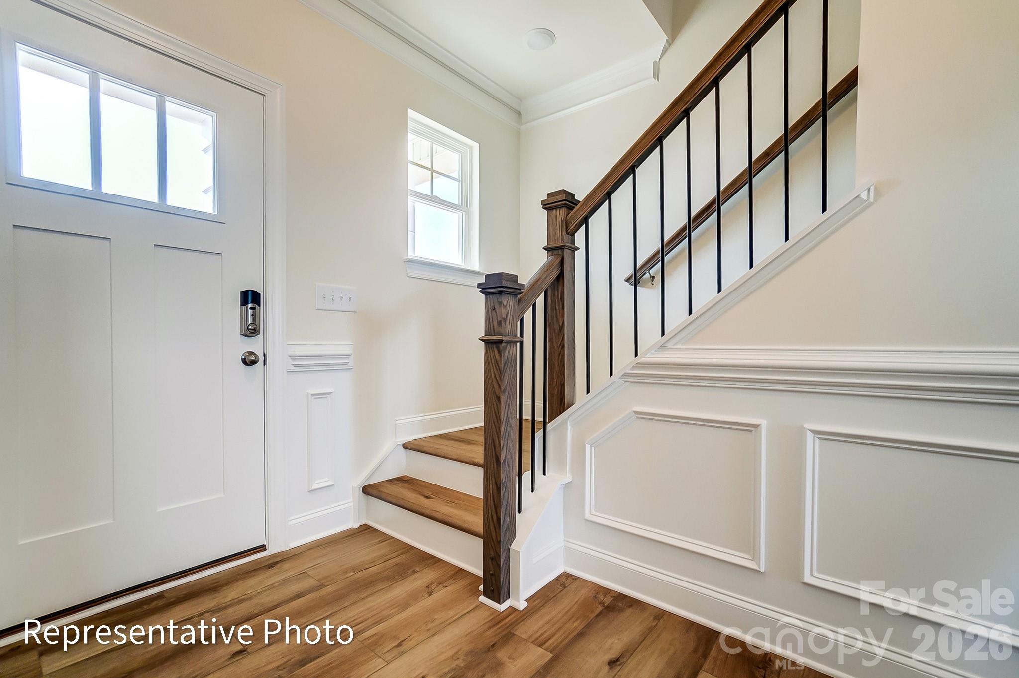 13127 Foxberry Road Charlotte, NC 28213 - Photo 12 of 24 a view of an entryway with staircase