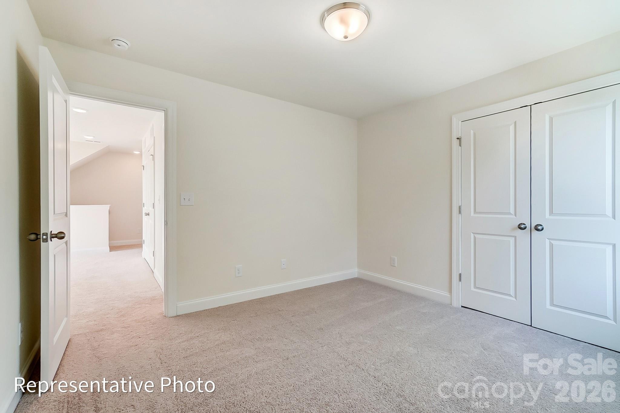 13127 Foxberry Road Charlotte, NC 28213 - Photo 20 of 24 an empty room with a bathroom