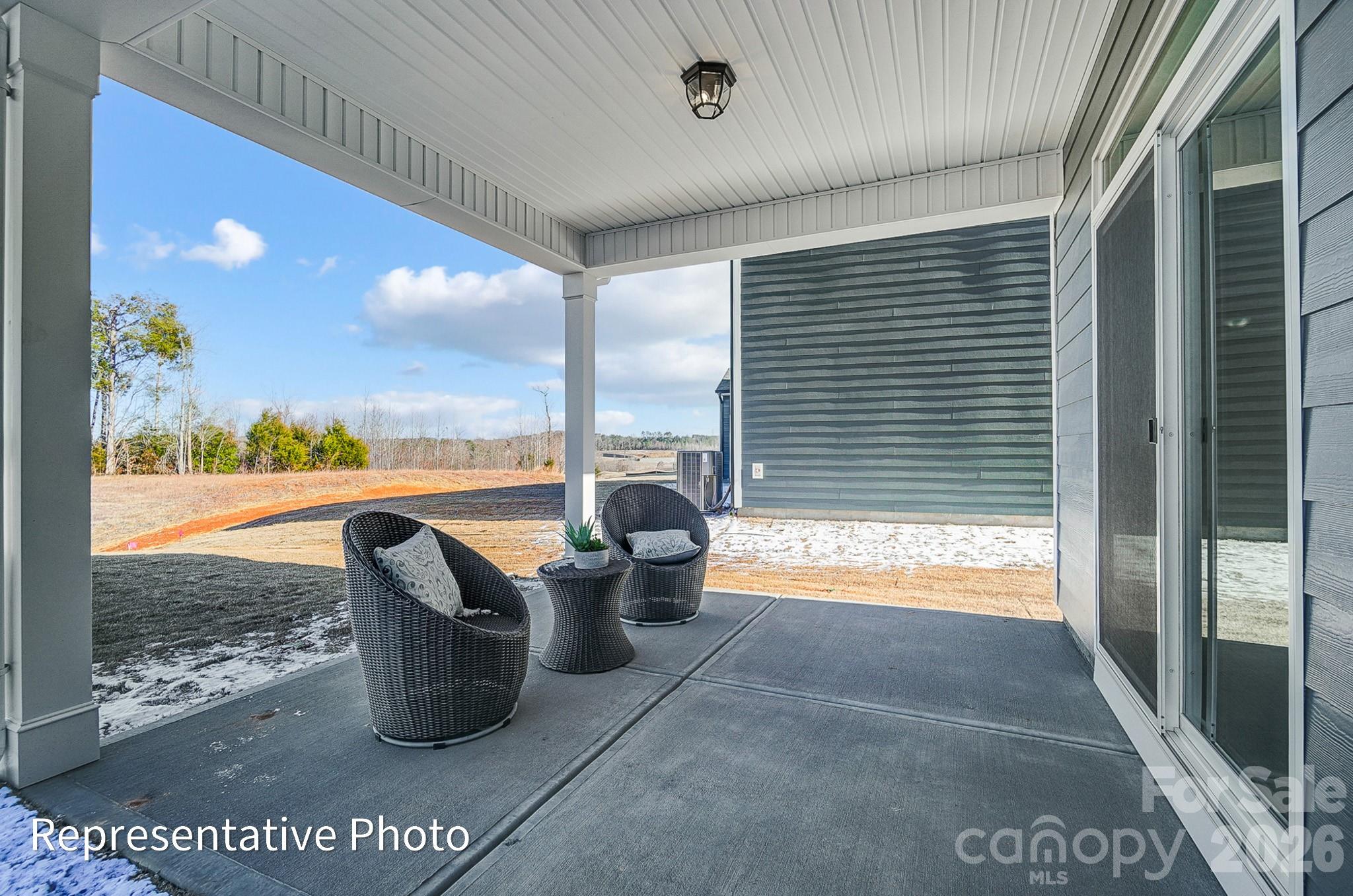 13127 Foxberry Road Charlotte, NC 28213 - Photo 24 of 24 a view of a porch with furniture