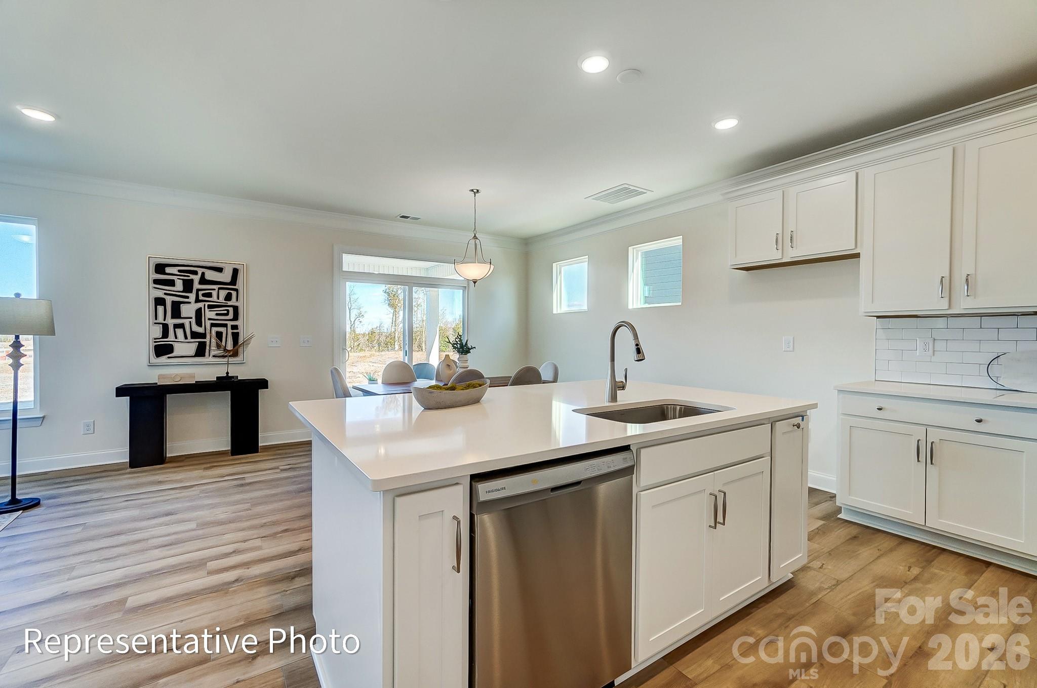 13127 Foxberry Road Charlotte, NC 28213 - Photo 8 of 24 a kitchen with sink and cabinets