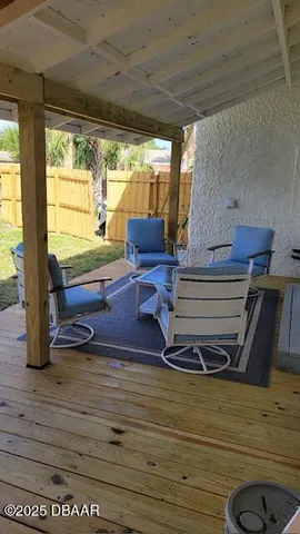 a view of a chairs in the patio