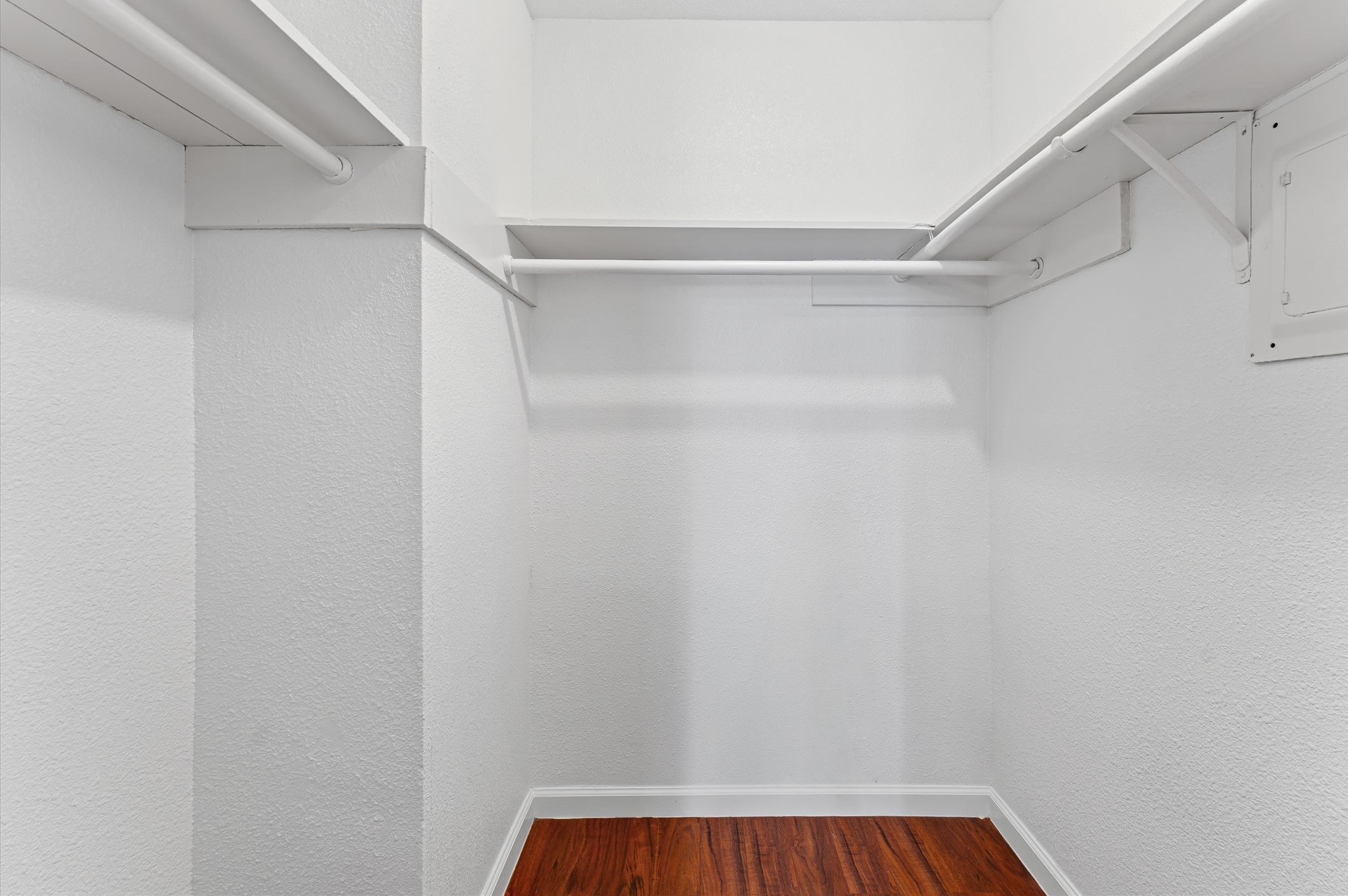 6161 Reims Road, Unit 1111 Houston, TX 77036 - Photo 14 of 19 a view of walk in closet with empty racks