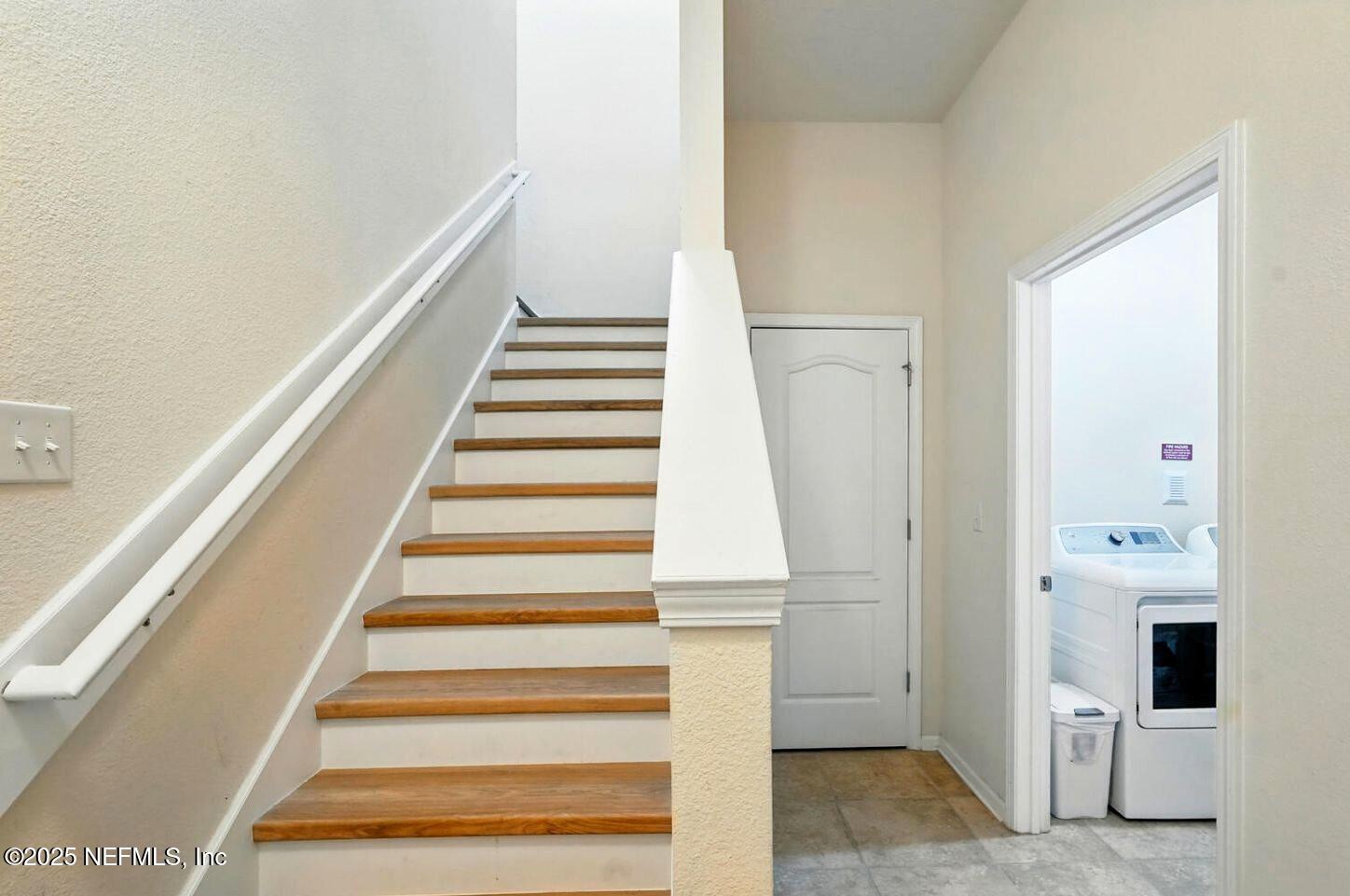 2103 Golden Lake Loop, Unit 2103 St. Augustine, FL 32084 - Photo 20 of 32 a view of entryway and hall with wooden floor