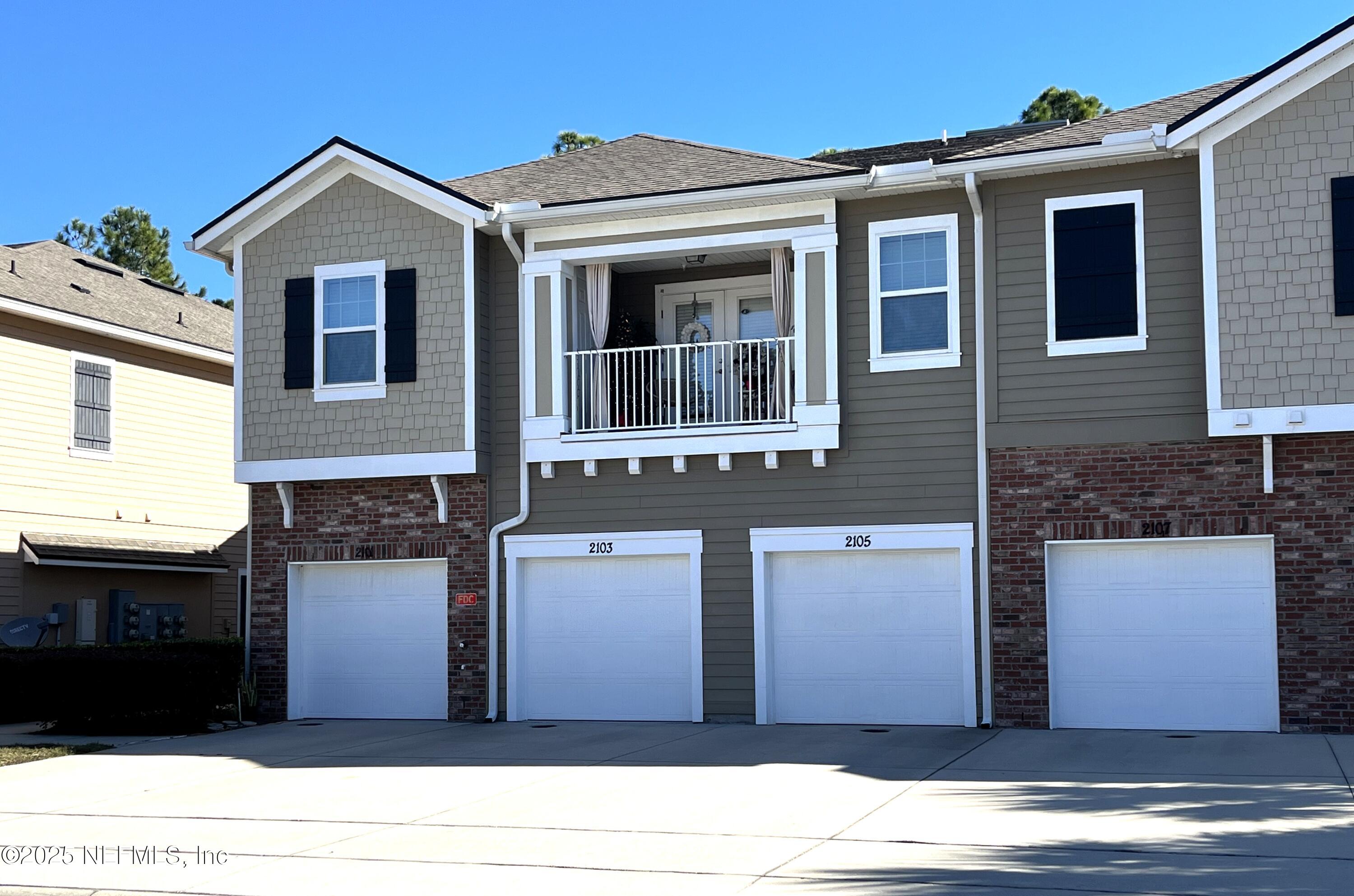 2103 Golden Lake Loop, Unit 2103 St. Augustine, FL 32084 - Photo 25 of 32 a front view of a house