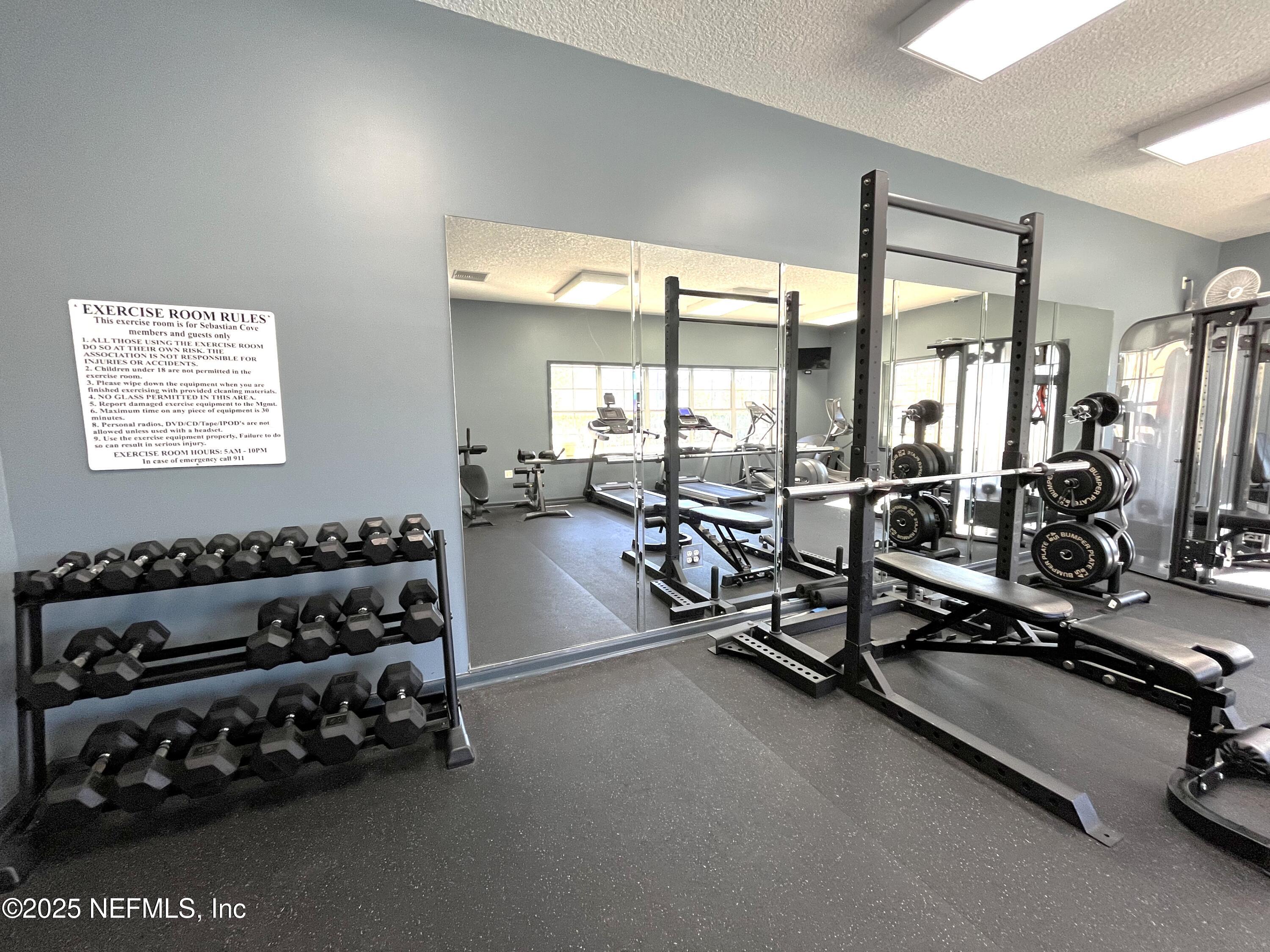2103 Golden Lake Loop, Unit 2103 St. Augustine, FL 32084 - Photo 28 of 32 a view of a room with gym equipment
