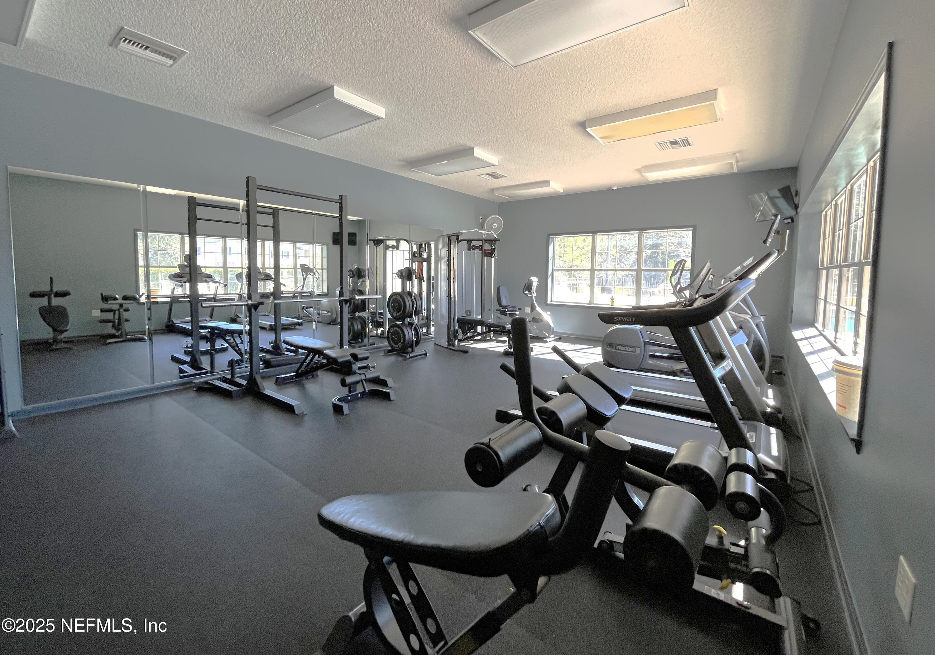 2103 Golden Lake Loop, Unit 2103 St. Augustine, FL 32084 - Photo 29 of 32 a view of a room with gym equipment