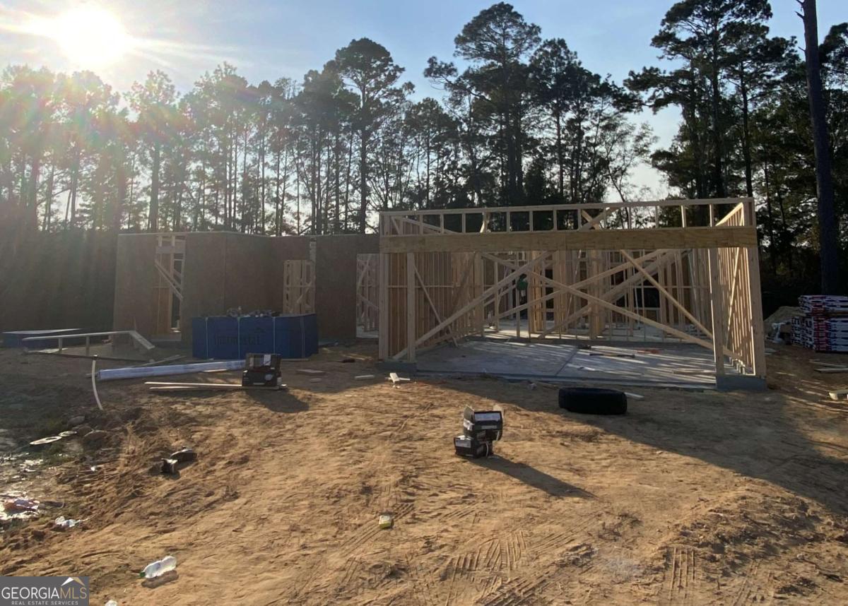 a view of a backyard of a house