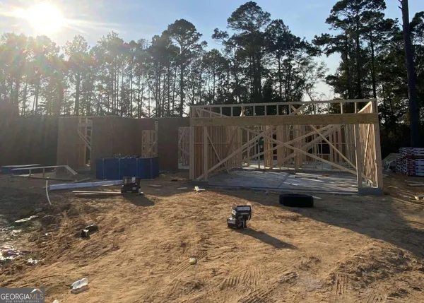 a view of a backyard of a house