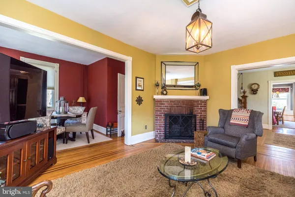 a view of a hallway with a livingroom