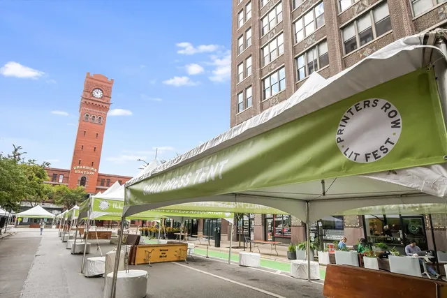 a view of a city with tall buildings