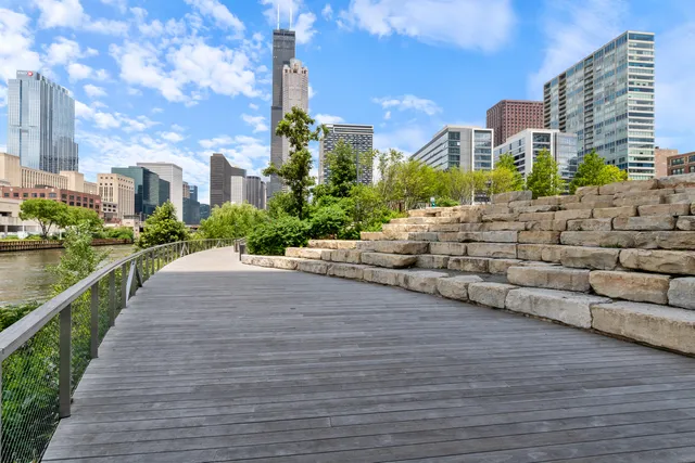 a view of a garden with a building in the background