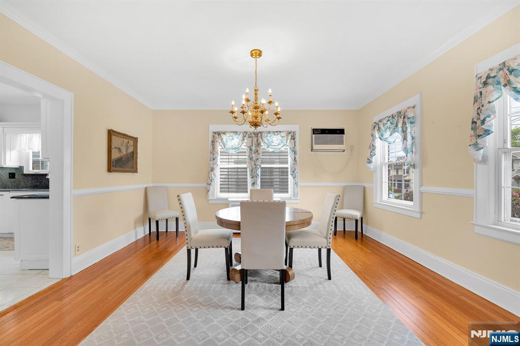 106 Maple Street Rutherford, NJ 07070 - Photo 14 of 50 a view of a dining room with furniture window and wooden floor