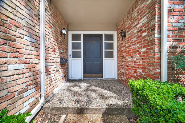 a view of front door with outdoor space