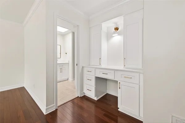 a bathroom with a toilet sink shower and mirror