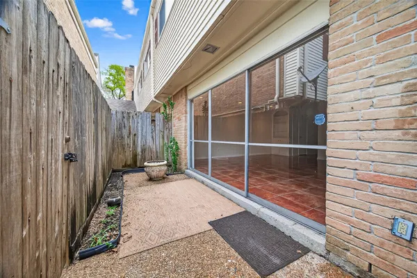 a view of a backyard of a house