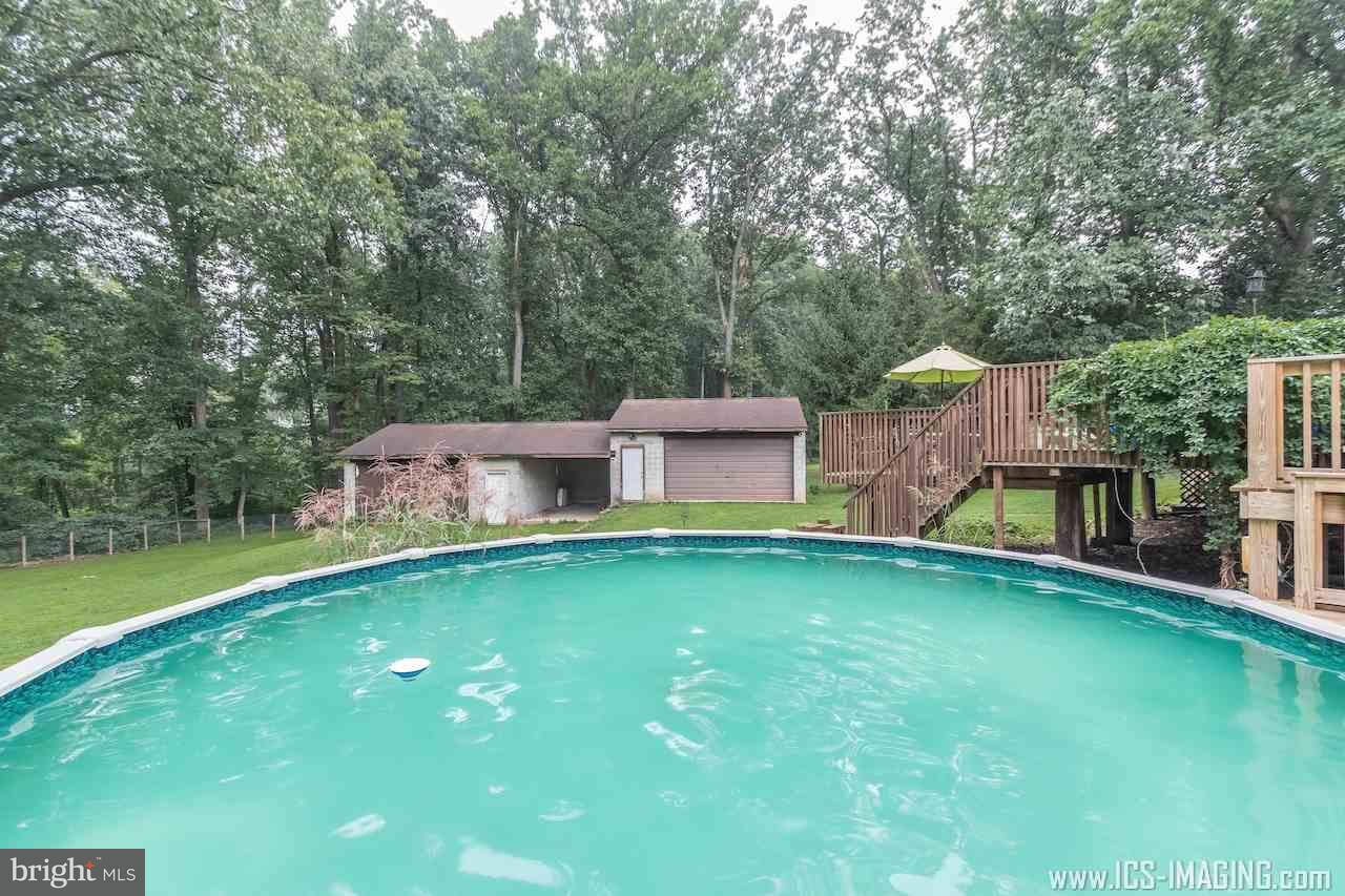 2105 Copenhaffer Road Dover, PA 17315 - Photo 27 of 36 a backyard of a house with table and chairs
